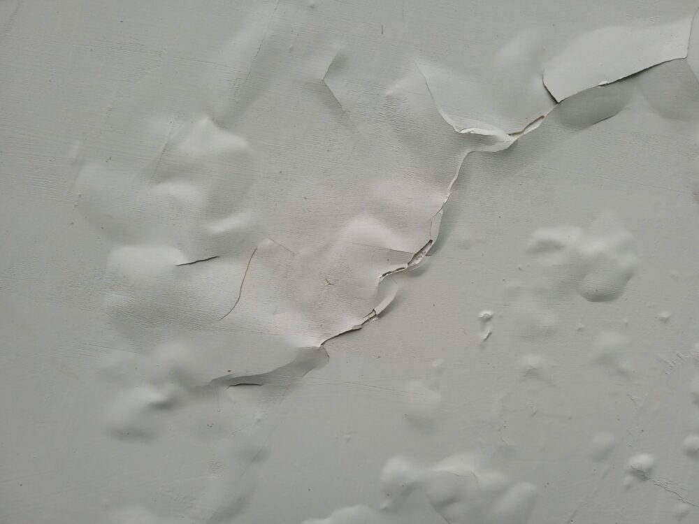 Why is the paint on my wall craacking?